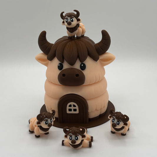 Kuh-Haus mit vier niedlichen Kühen